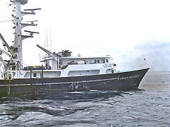 The Venezuelan purse seiner La Rosa Mistica draws closer to the sportfishing boat &amp;quot;Silver-Rod-O.&amp;quot;
